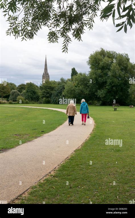 Elderly Ladies Walking Through Queen Elizabeth Gardens With Salisbury