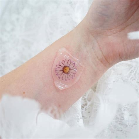 Daisy Wrist Tattoo