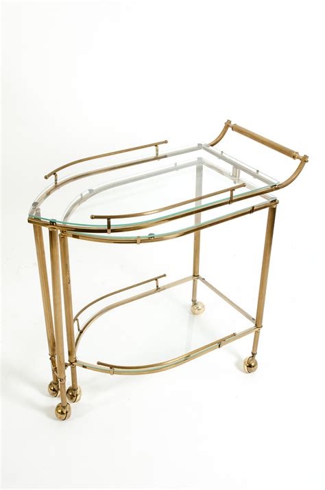 Mid 20th Century Brass Glass Three Tier Swivel Wheeled Bar Cart La