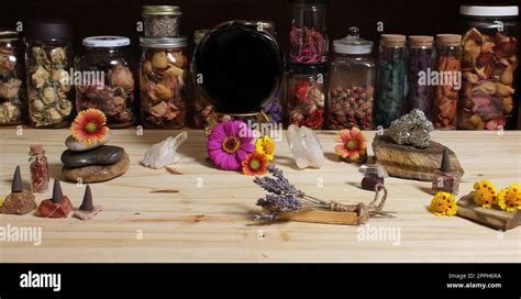 Meditation Altar With Rock Crystals And Flowers Jars Of Herbs In