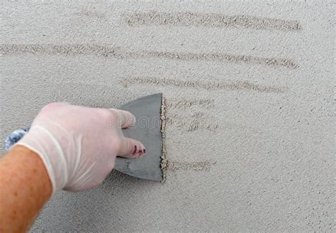 Plastering using a trowel stock image. Image of floor - 65139541