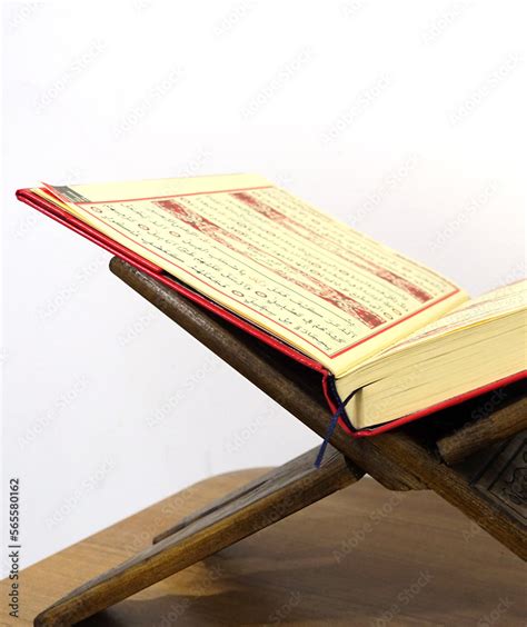 The Holy Book Of Islam The Holy Quran On A Wooden Lectern The Open