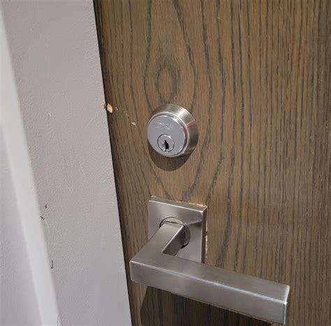 This scratch appeared on my apartment door last night, does this look