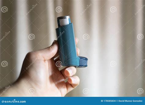 Blue Asthma Inhaler Medication Isolated On White Background Stock