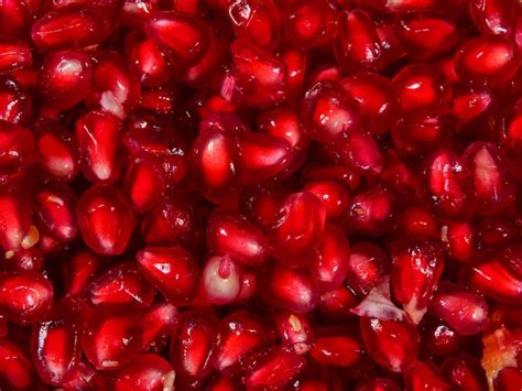 Premium Photo | Red pomegranate seeds