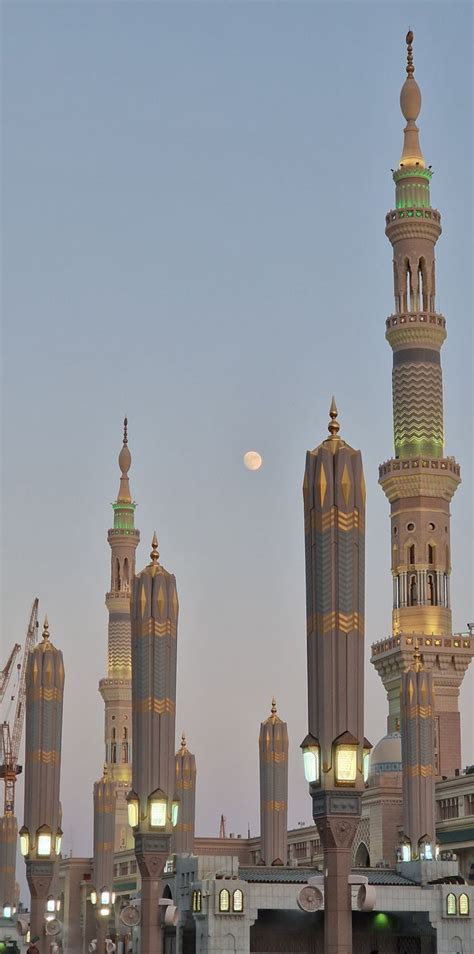 A Group Of Tall Buildings Sitting Next To Each Other