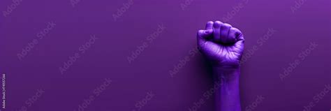 International Womens Day Banner Of A Purple Fist As A Sign Of