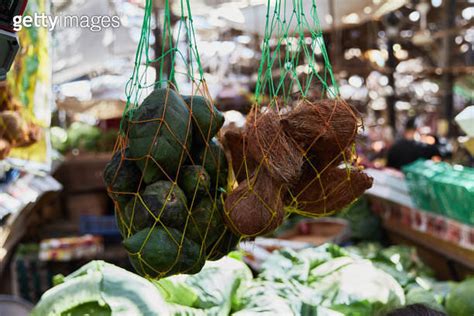 Coconuts And Avocados In A Mesh Bag On The Egyptian Market Fresh