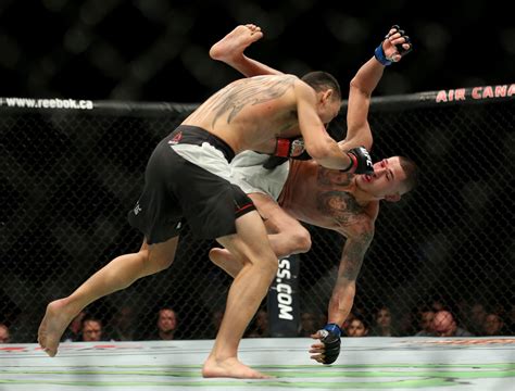 Ufc 206 Max Holloway Wins Interim Featherweight Title With Third Round