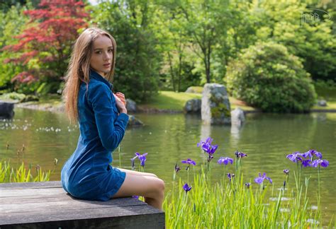 Обои women model brunette women outdoors nature lake trees flowers sitting looking at