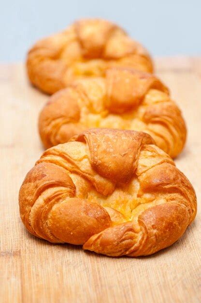 Premium Photo Close Up Of Croissants Served On Table