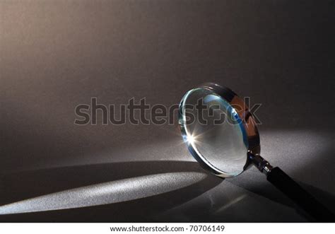 Closeup Magnifying Glass Standing On Dark Stock Photo (Edit Now) 70706149