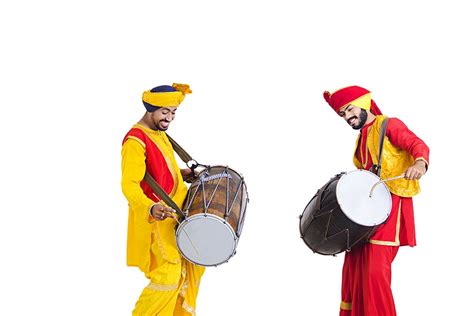 Two Sikh Punjabi Sardar Playing Dhol And Dancing Bhangra On Vaisakhi