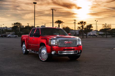 Candy Red GMC Sierra on DUB Spinners Wheels — CARiD.com Gallery