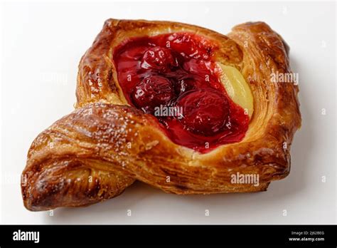 Cherry Danish pastry on white background Stock Photo - Alamy