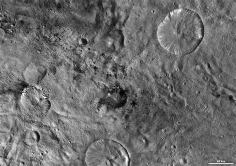 The Bright And Dark Side Of Vestas Craters Universe Today