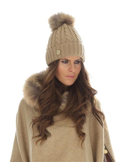 The Cable Knit Raccoon Fur Pom Pom Bobble Hat Available For £3500 In