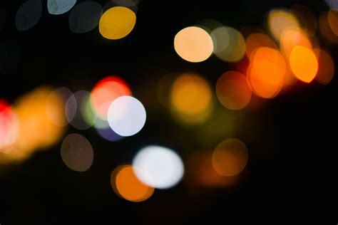 Free stock photo of blurry background, city lights, gold tone