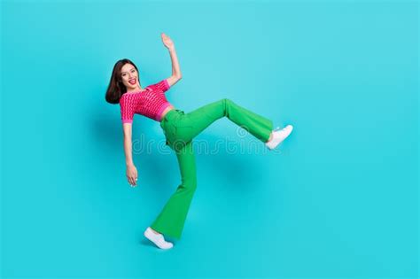 Photo Of Pretty Positive Girl Dancing Nightclub Doing Huge Step Isolated Over Blue Color