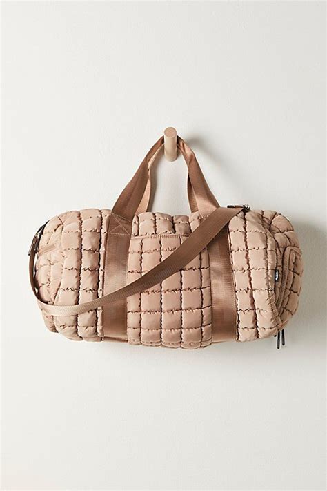 Quilted Duffle By Fp Movement At Free People Khaki In 2024 Quilted