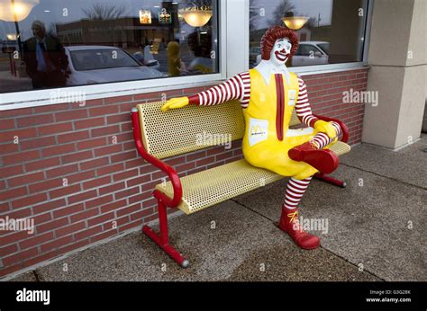 Ronald Mcdonald Clown Statue Sitting On Fast Food Restaurants Bench