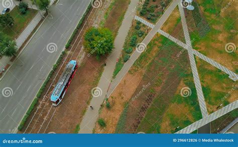 Top View Of Modern Tram In City With Park Clip Tram In Motion On