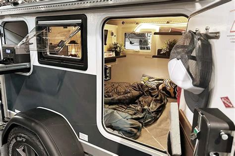 This tiny caravan uses one smart feature to almost double its space ...