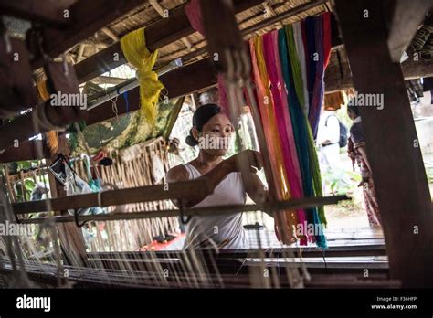 A Woman Works At A Loom In Kachin State Myanmar Stock Photo Alamy