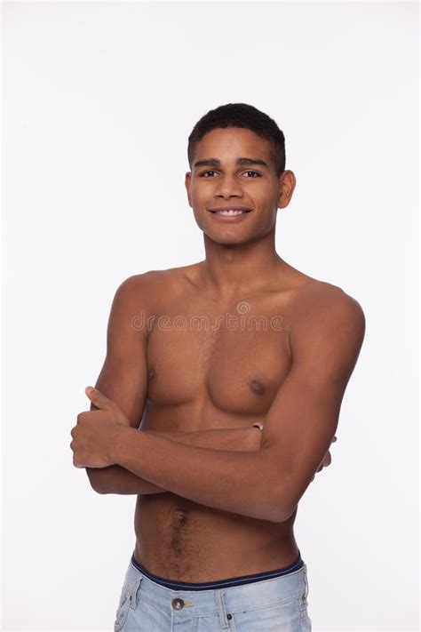 Naked African Man Toothy Smiles Looking Up On Black Background