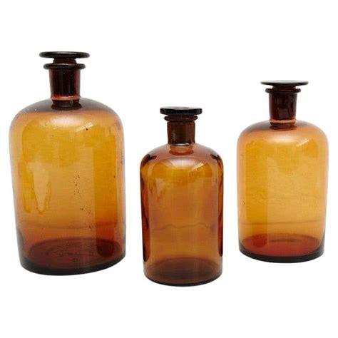 Set Of Three French Vintage Amber Glass Pharmacy Bottle Circa 1930 For Sale At 1stdibs