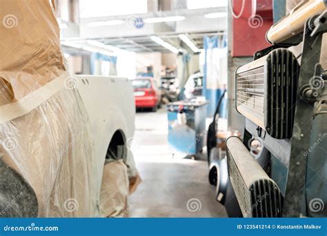 Garage Painting Car Service Section Of The Car Is Covered With Primer