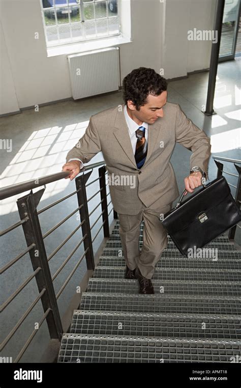 Businessman Running With His Briefcase High Resolution Stock