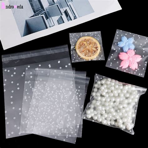 100pcs Plastic Transparent Cellophane T Bags White Polka Dot Candy