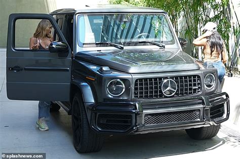 Georgia Harrison Parades Her Toned Abs In A Skimpy Bikini And Baggy Jeans While With Friends In