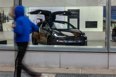 Tesla Warns Of Slowing Growth Before New Model Launch Next Year