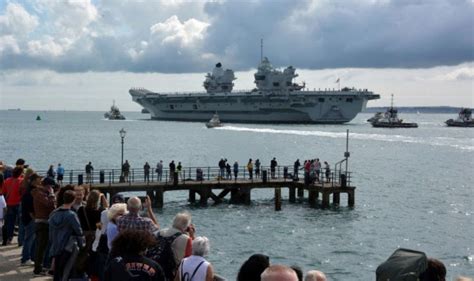 Brilliant pictures show Royal Navy aircraft carrier leaving Britain for ...