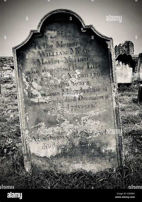 Victorian tombstone at the graveyard of Whitby abbey, setting of ...