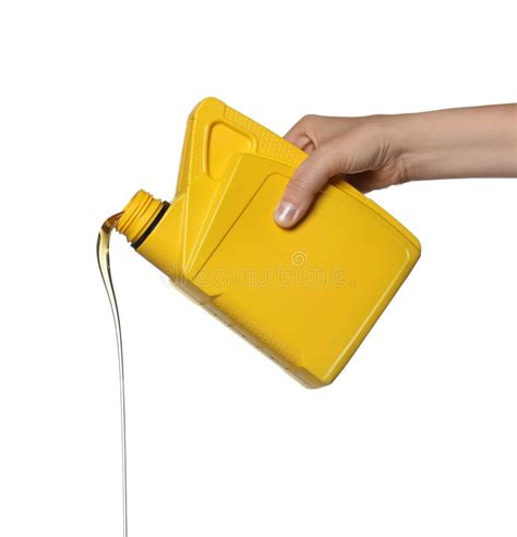 Man Pouring Motor Oil From Yellow Container On Background Closeup