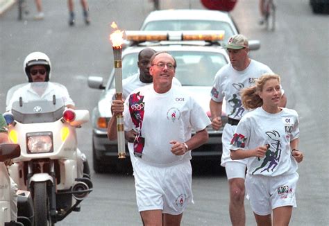 1996 flashback: Jim Boeheim carries Olympic torch through Syracuse ...