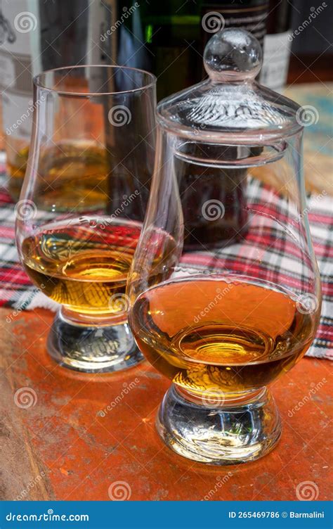 Tulip Shaped Tasting Glass With Dram Of Scotch Single Malt Or Blended