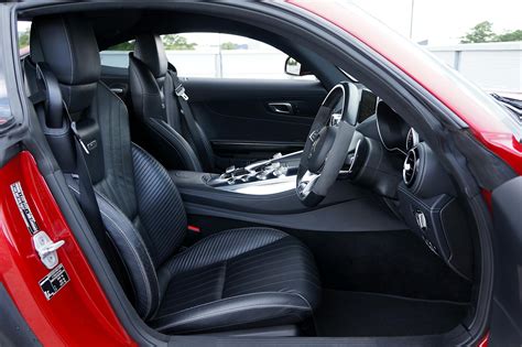 Mercedes-AMG GT Interior with Black Leather Upholstery and Steering Wheel on the Right Side ...