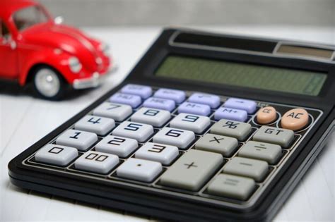 premium photo calculator  car concept  calculating cost