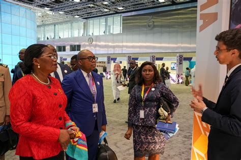 Togolese Prime Minister Victoire Sidemeho Tomegah-Dogbe (in red