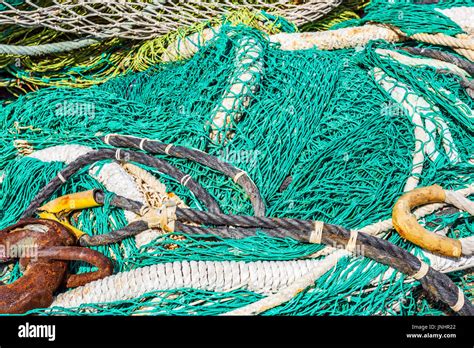 Fishing net background Stock Photo - Alamy