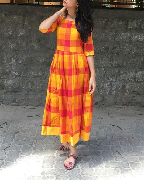 Orange and yellow checks dress by Threeness | The Secret Label