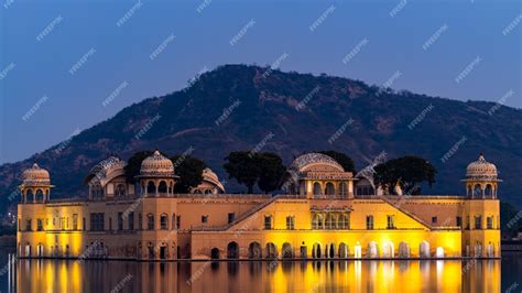 Premium Photo | Jal Mahal Palace at night, Jal Mahal in the middle of ...