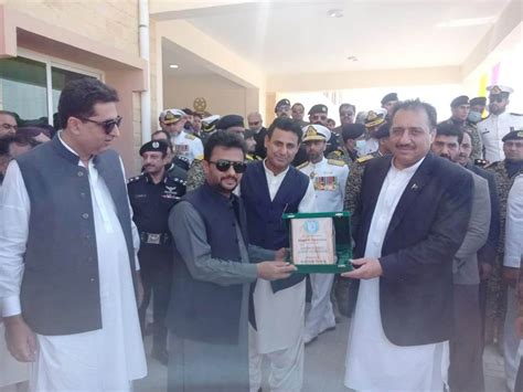 Presenting Souvenir To Syed Zahor Ahmed Agha Governor Balochistan