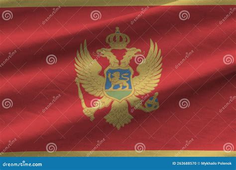 Montenegro Flag with Big Folds Waving Close Up Under the Studio Light ...