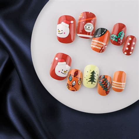 24 Piece Christmas Wearable Snowflake Reindeer Santa False Nail Box （3ml） Clear Nails Full Cover