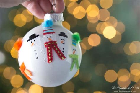 Handprint Ornament and DIY Christmas Ornament Ideas - The Heathered Nest